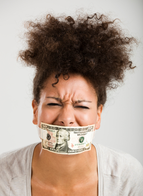 Covering mouth with a dollar banknote