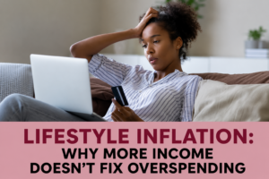 Woman sitting on a couch with a laptop and credit card, looking concerned about spending and lifestyle inflation.
